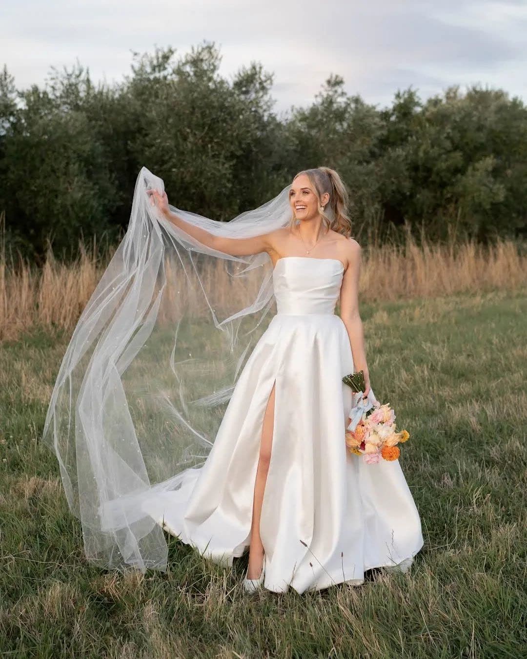 Bride in a wedding dress altered by Sarah Stoute Bespoke, Christchurch — photo 11
