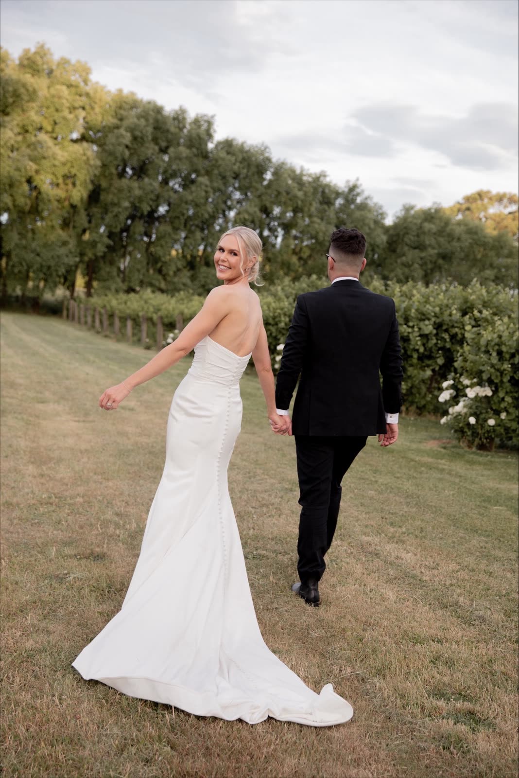 Bride in a wedding dress altered by Sarah Stoute Bespoke, Christchurch — photo 15