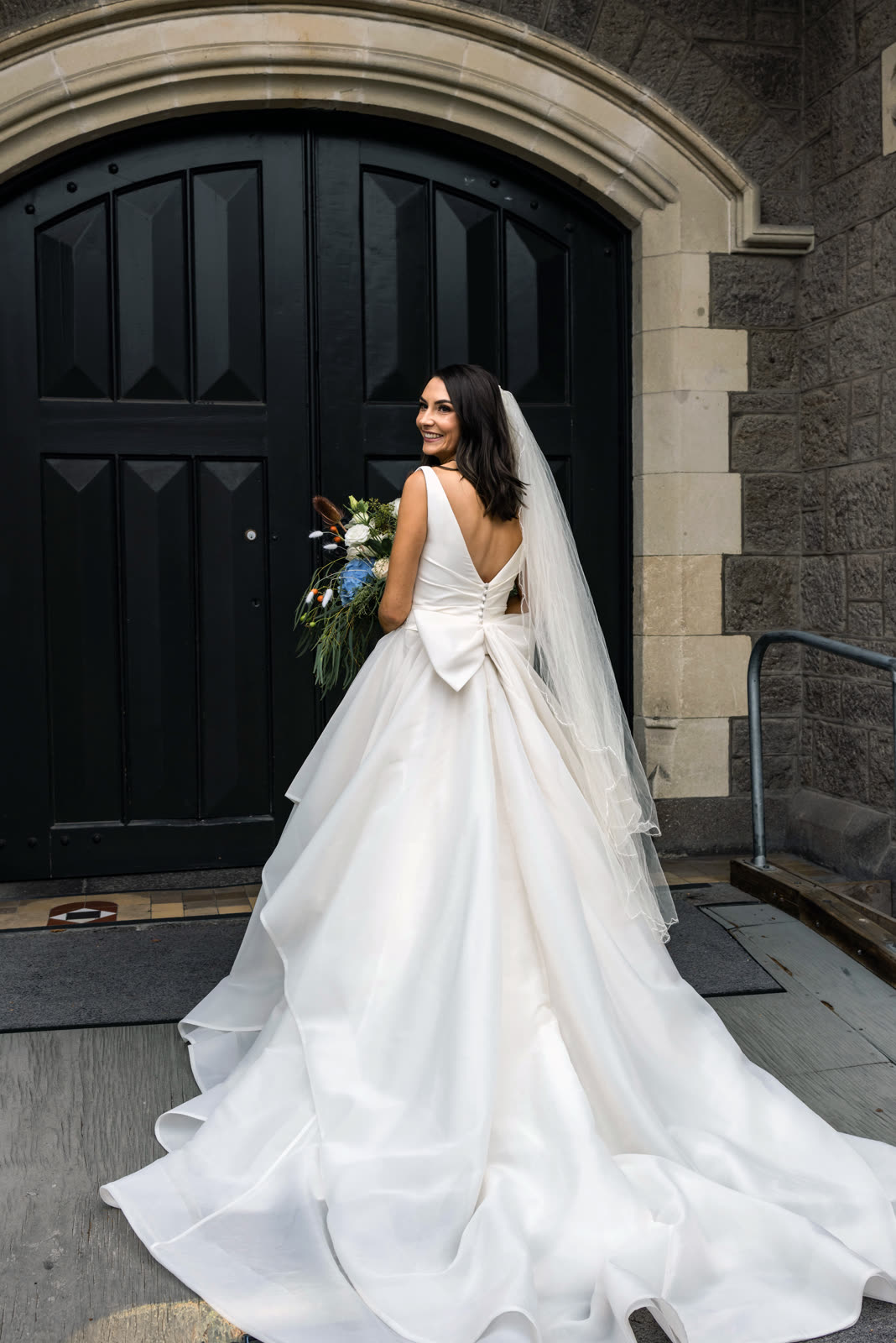 Bride in a wedding dress altered by Sarah Stoute Bespoke, Christchurch — photo 21