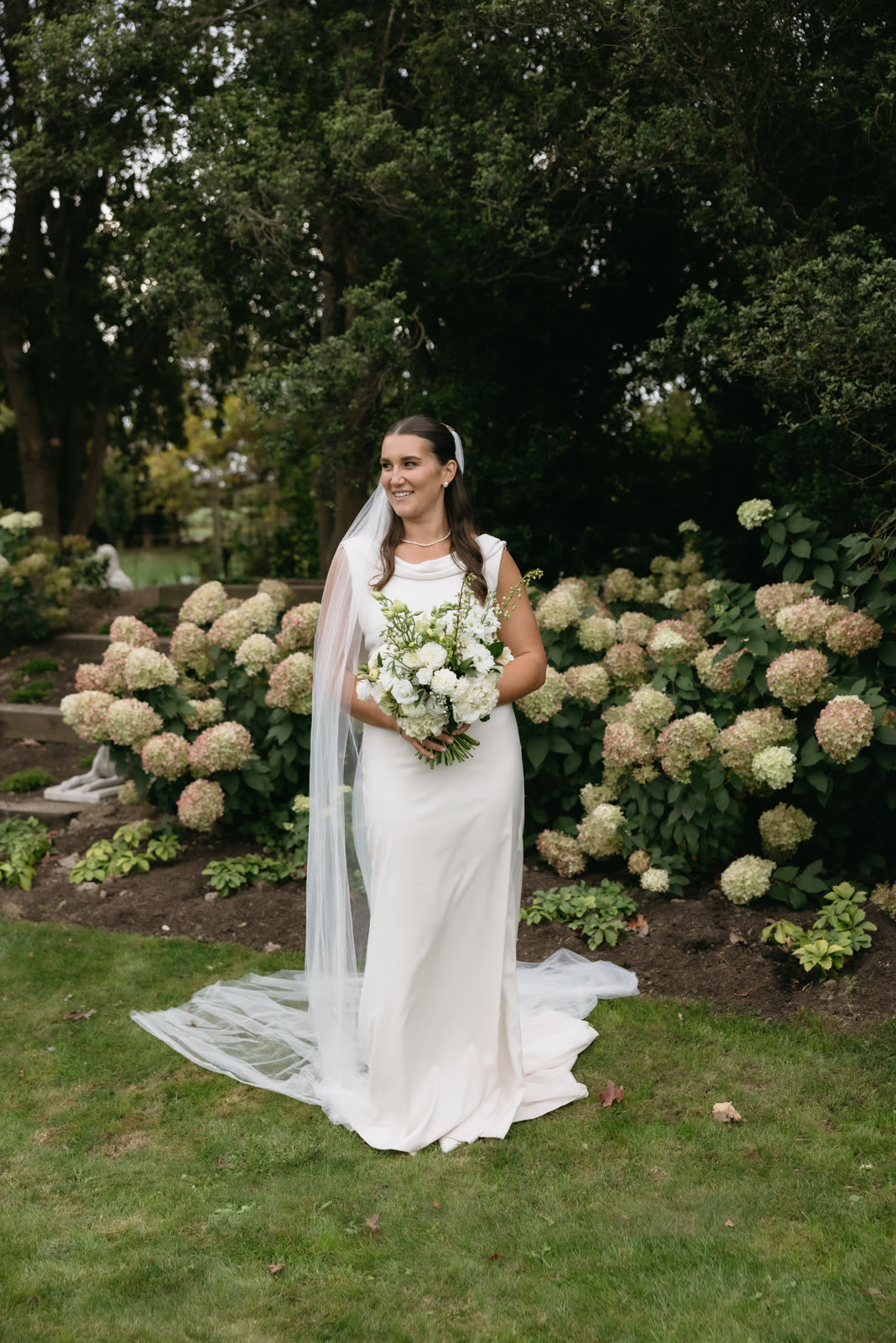 Bride in a wedding dress altered by Sarah Stoute Bespoke, Christchurch — photo 42