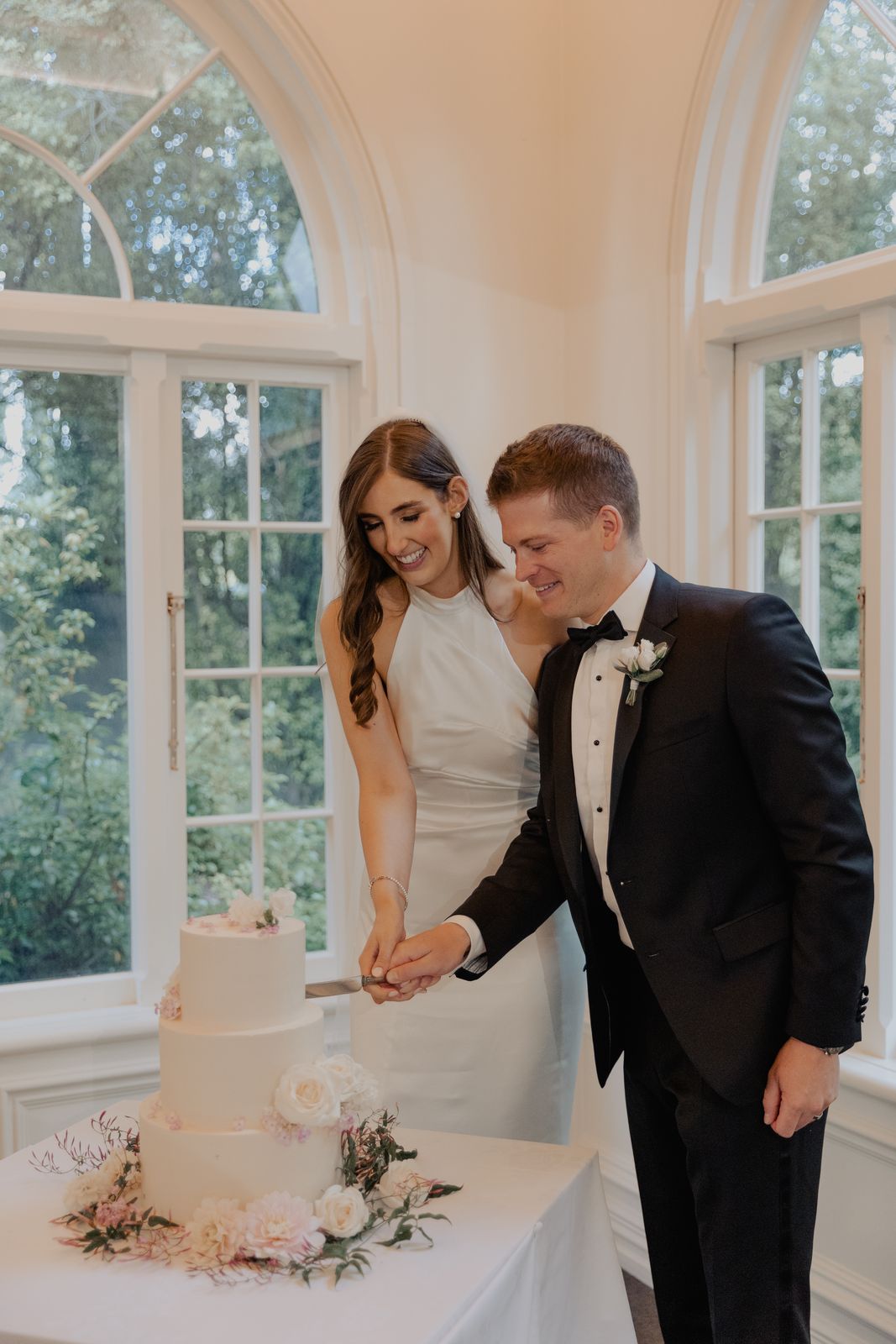Harriet wearing her bespoke wedding dress designed by Sarah Stoute, Christchurch — photo 1