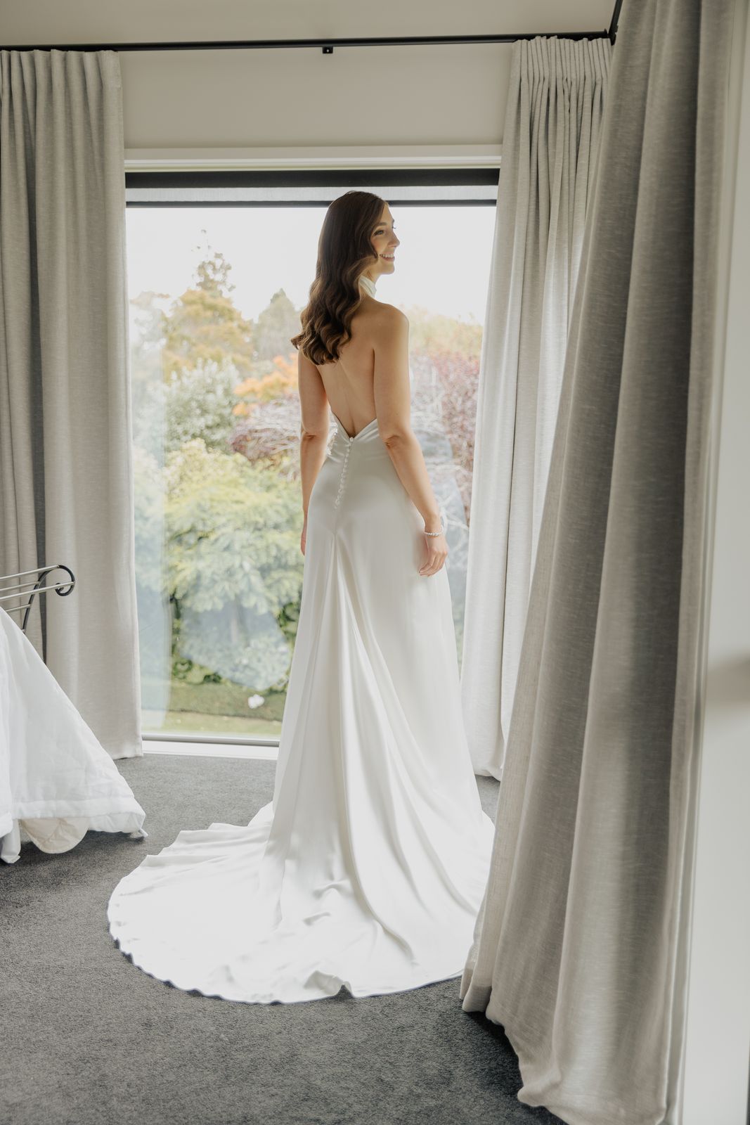 Harriet wearing her bespoke wedding dress designed by Sarah Stoute, Christchurch — photo 5