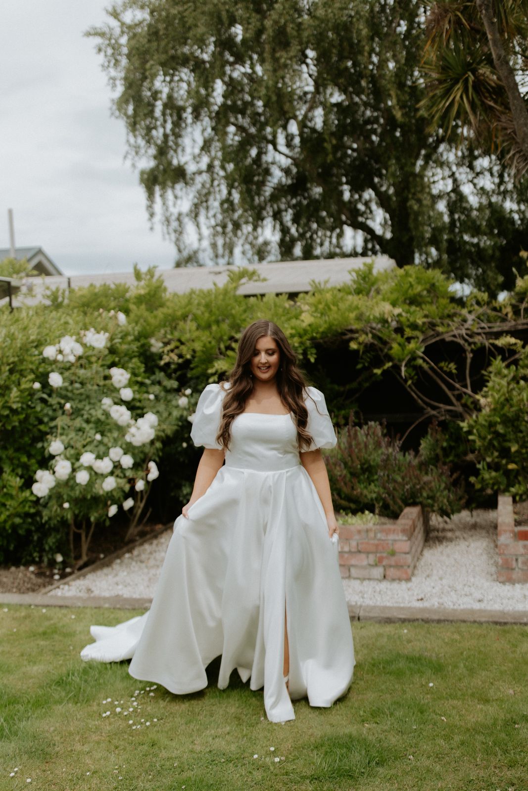 Milly wearing her bespoke wedding dress designed by Sarah Stoute, Christchurch — photo 2