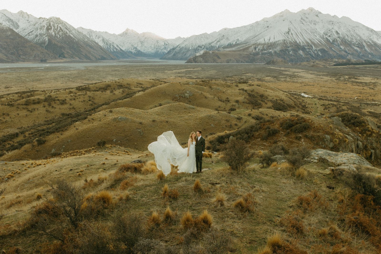 Winter bridal editorial at Mt Sunday, Canterbury — bespoke gown by Sarah Stoute — photo 5