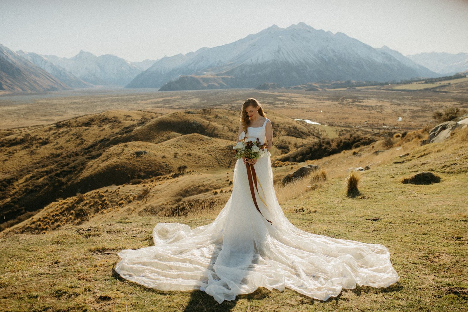 Winter bridal editorial at Mt Sunday, Canterbury — bespoke gown by Sarah Stoute — photo 7