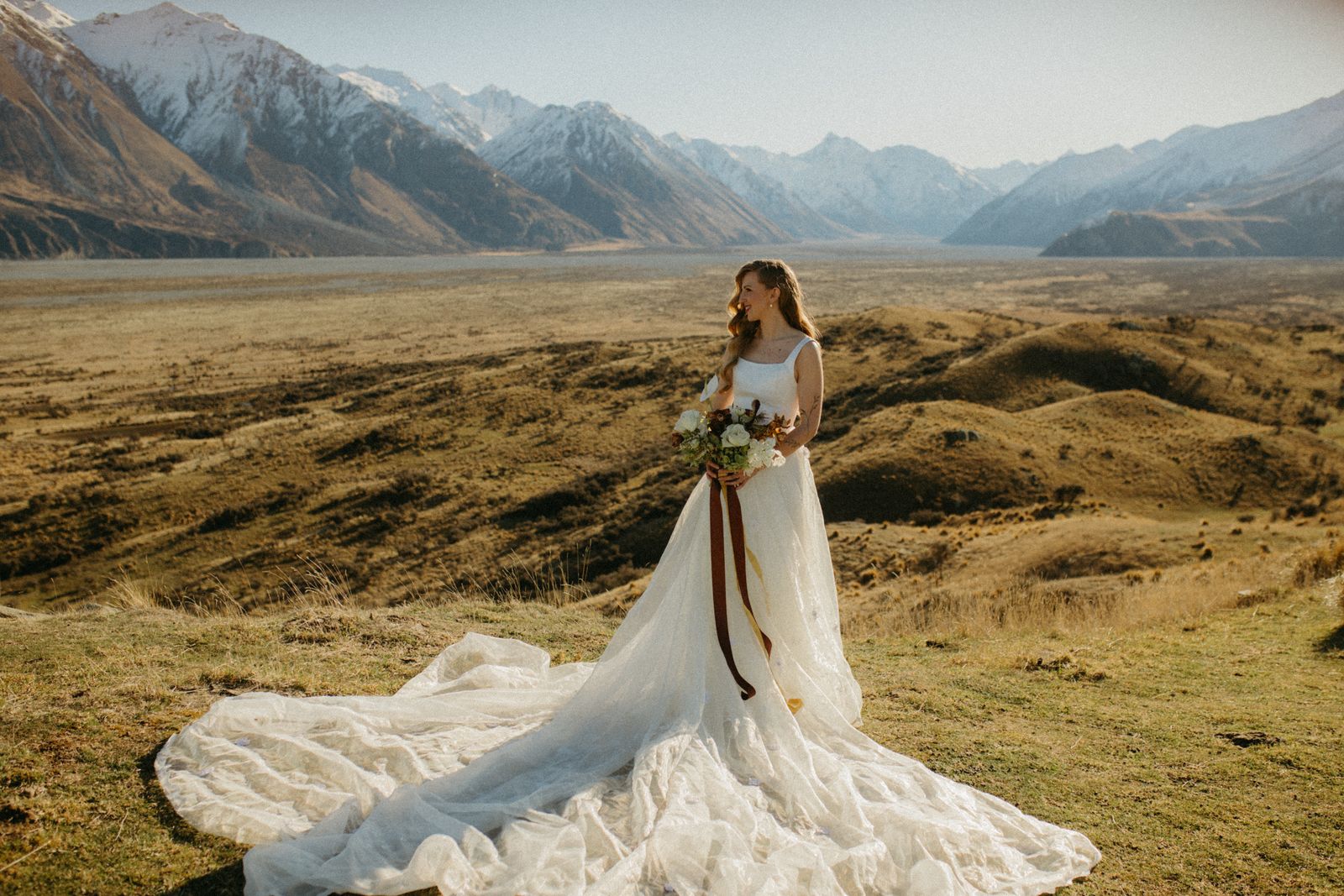 Winter bridal editorial at Mt Sunday, Canterbury — bespoke gown by Sarah Stoute — photo 8