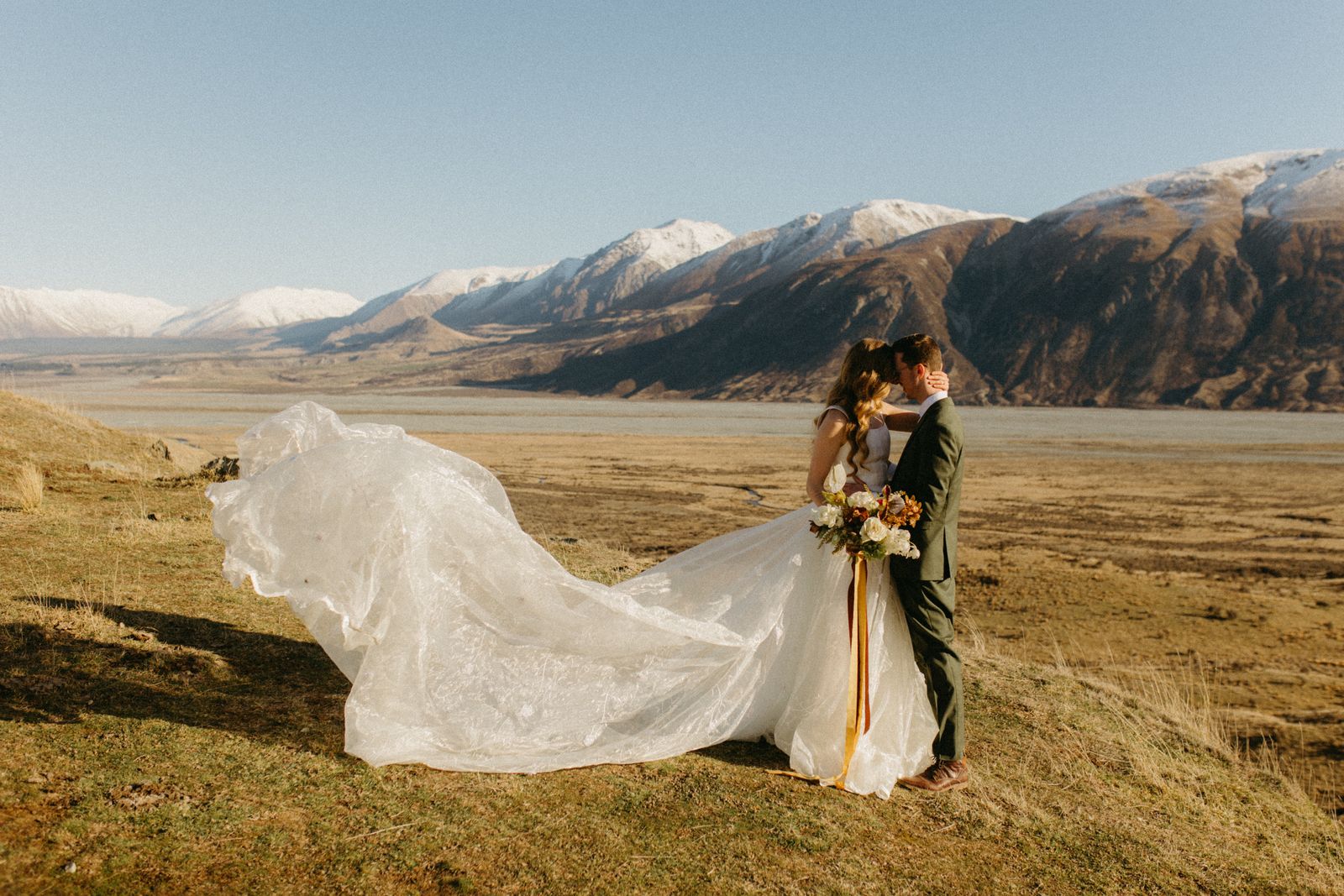 Winter bridal editorial at Mt Sunday, Canterbury — bespoke gown by Sarah Stoute — photo 11