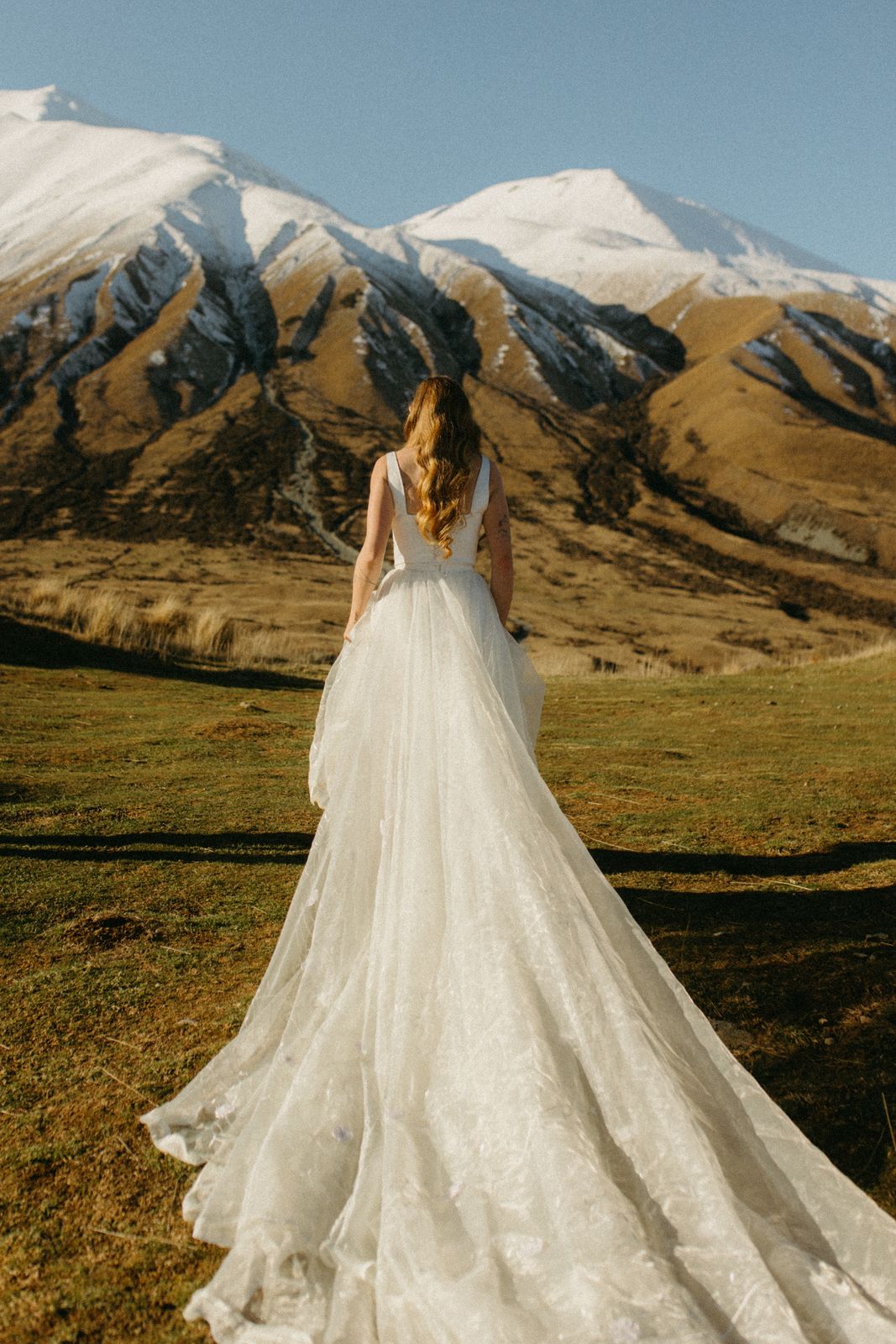 Winter bridal editorial at Mt Sunday, Canterbury — bespoke gown by Sarah Stoute — photo 12