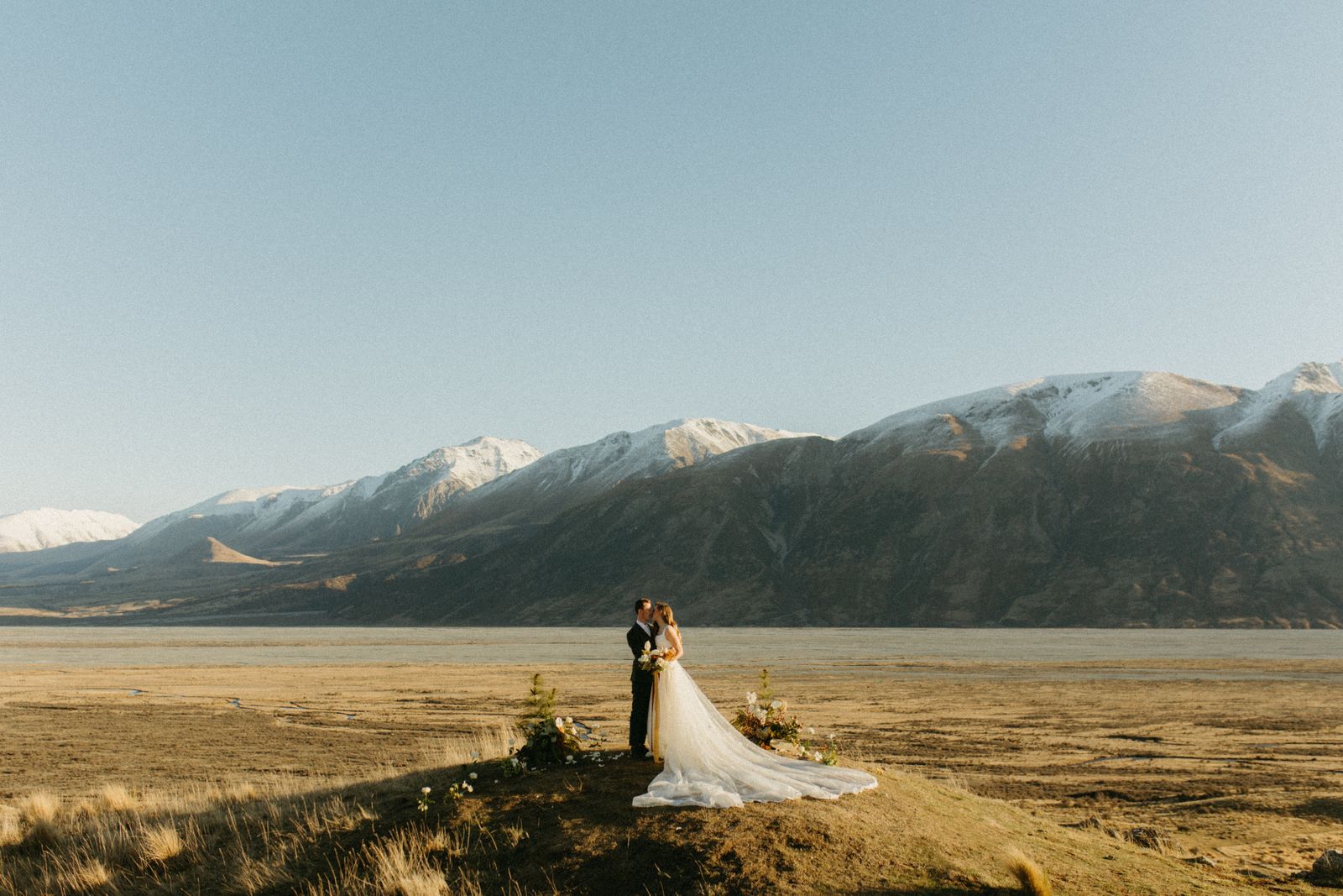 Winter bridal editorial at Mt Sunday, Canterbury — bespoke gown by Sarah Stoute — photo 14