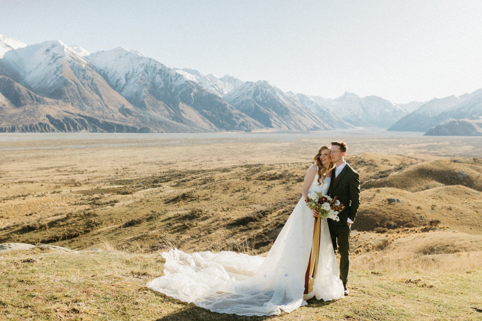 Winter bridal editorial at Mt Sunday, Canterbury — bespoke gown by Sarah Stoute — photo 15