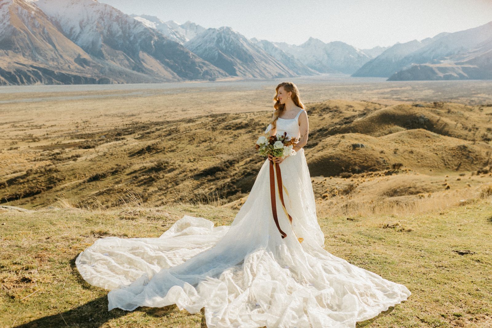 Winter bridal editorial at Mt Sunday, Canterbury — bespoke gown by Sarah Stoute — photo 16