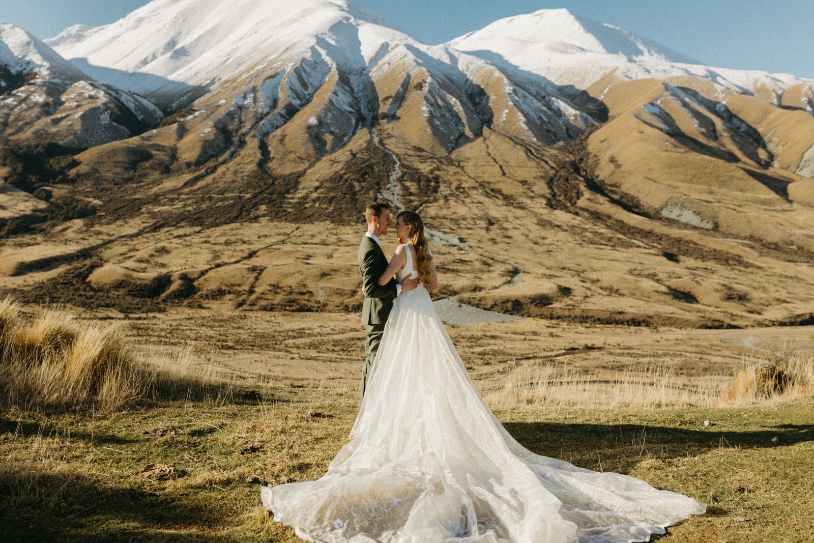 Winter bridal editorial at Mt Sunday, Canterbury — bespoke gown by Sarah Stoute — photo 17