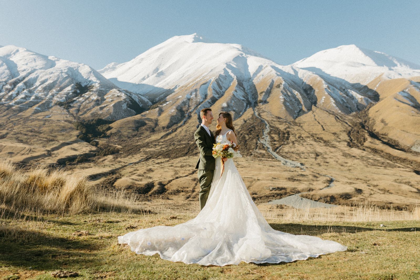 Winter bridal editorial at Mt Sunday, Canterbury — bespoke gown by Sarah Stoute — photo 18