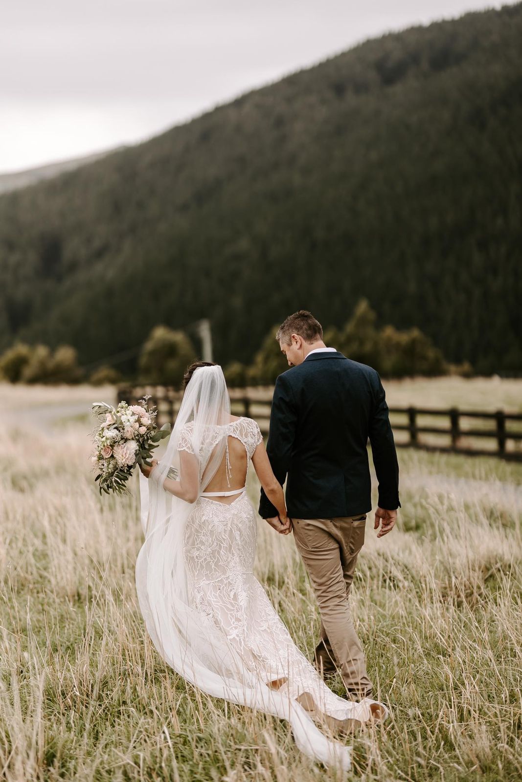 Bride in a Sarah Stoute bespoke gown in the mountains, Canterbury