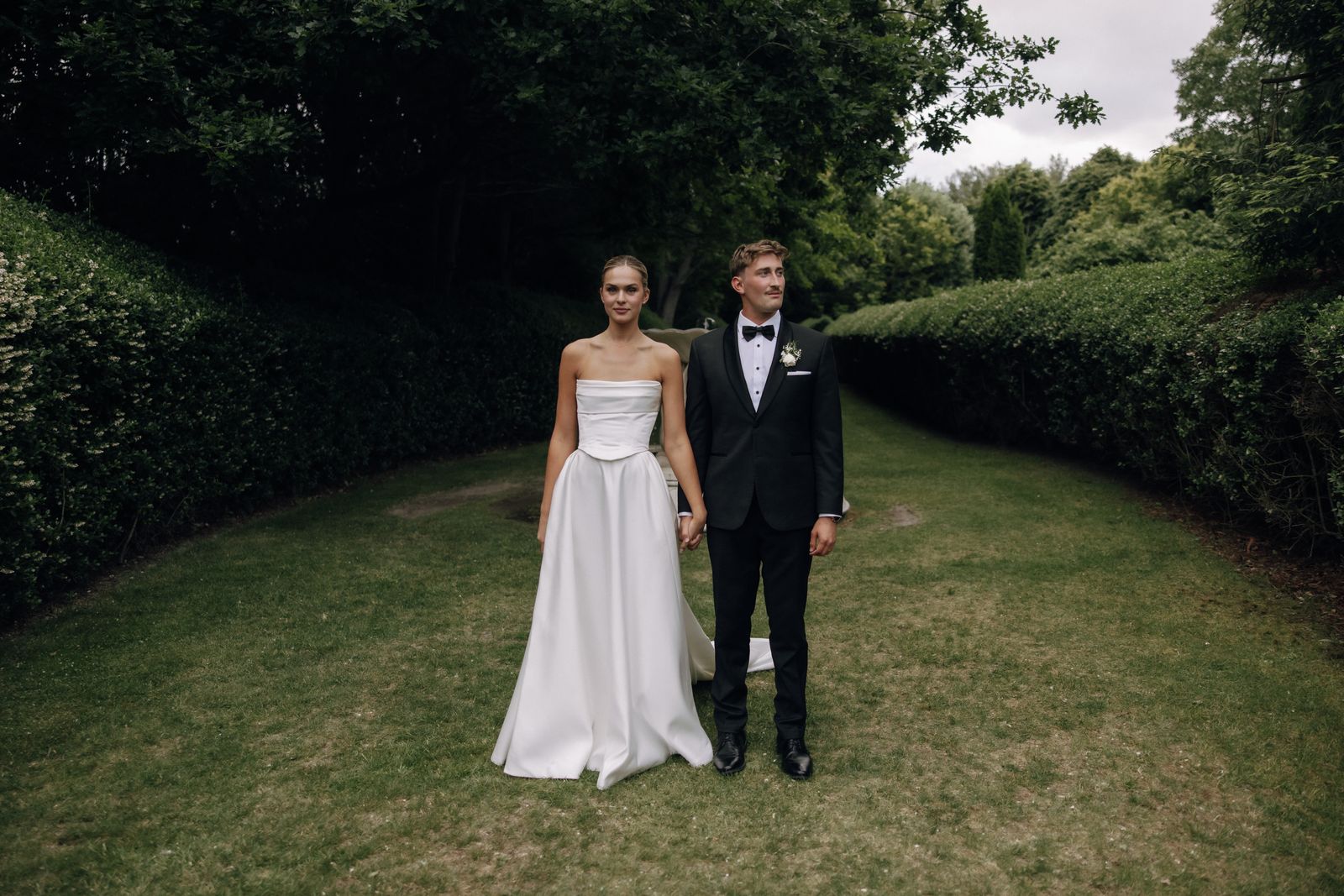 Samara wearing her bespoke wedding dress designed by Sarah Stoute, Christchurch — photo 5