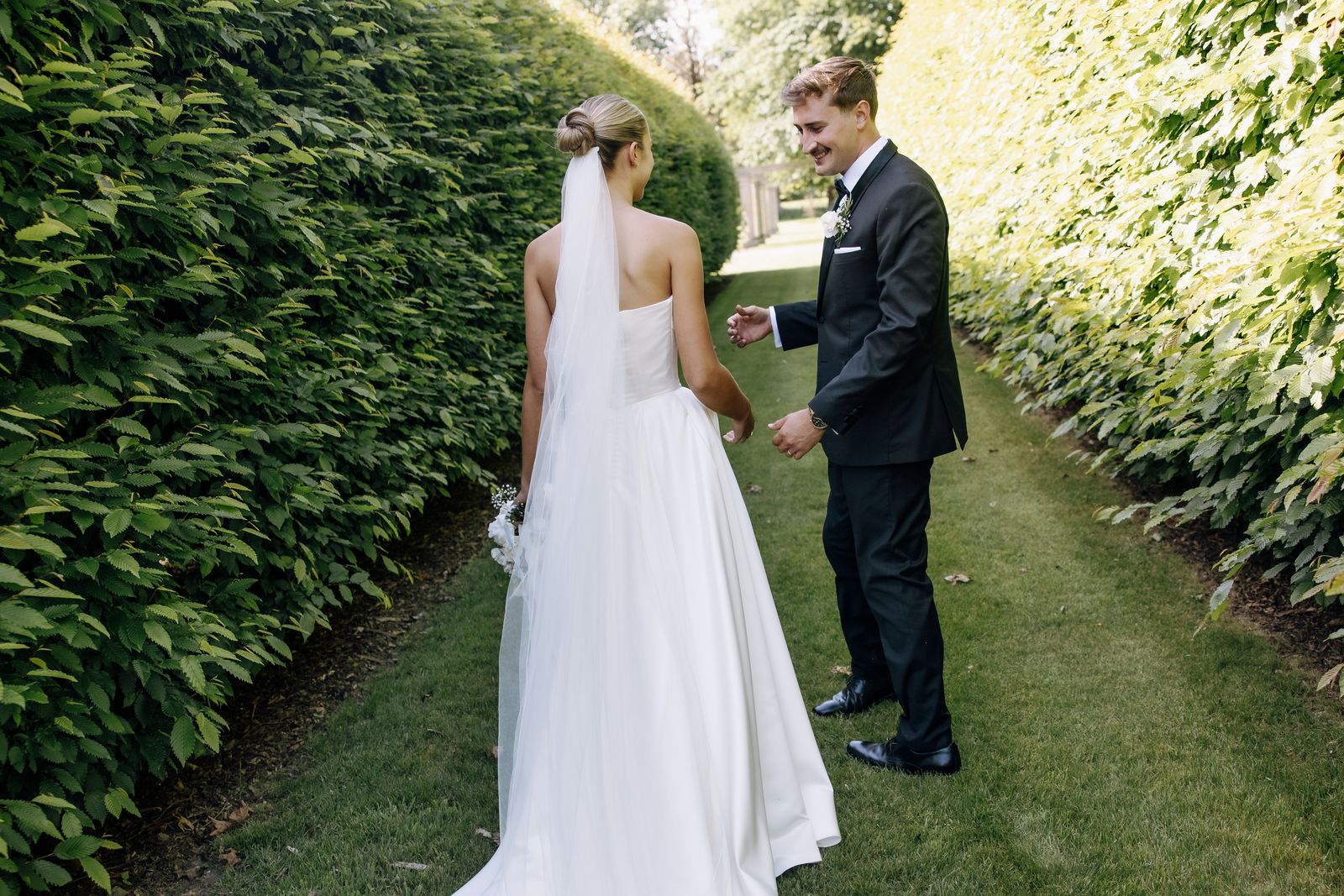 Samara wearing her bespoke wedding dress designed by Sarah Stoute, Christchurch — photo 10