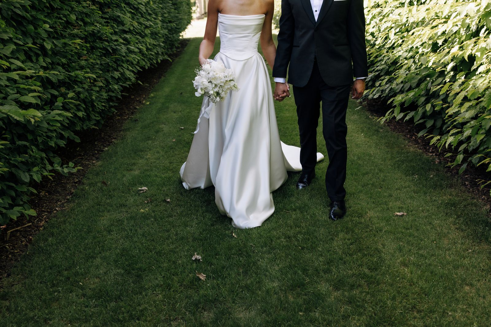 Samara wearing her bespoke wedding dress designed by Sarah Stoute, Christchurch — photo 11