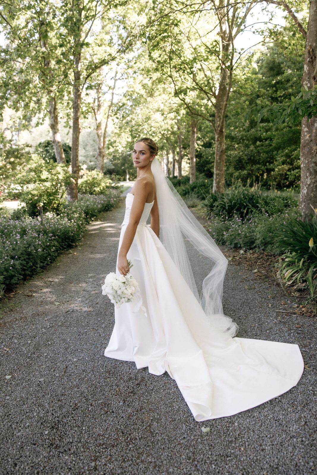 Samara wearing her bespoke wedding dress designed by Sarah Stoute, Christchurch — photo 14