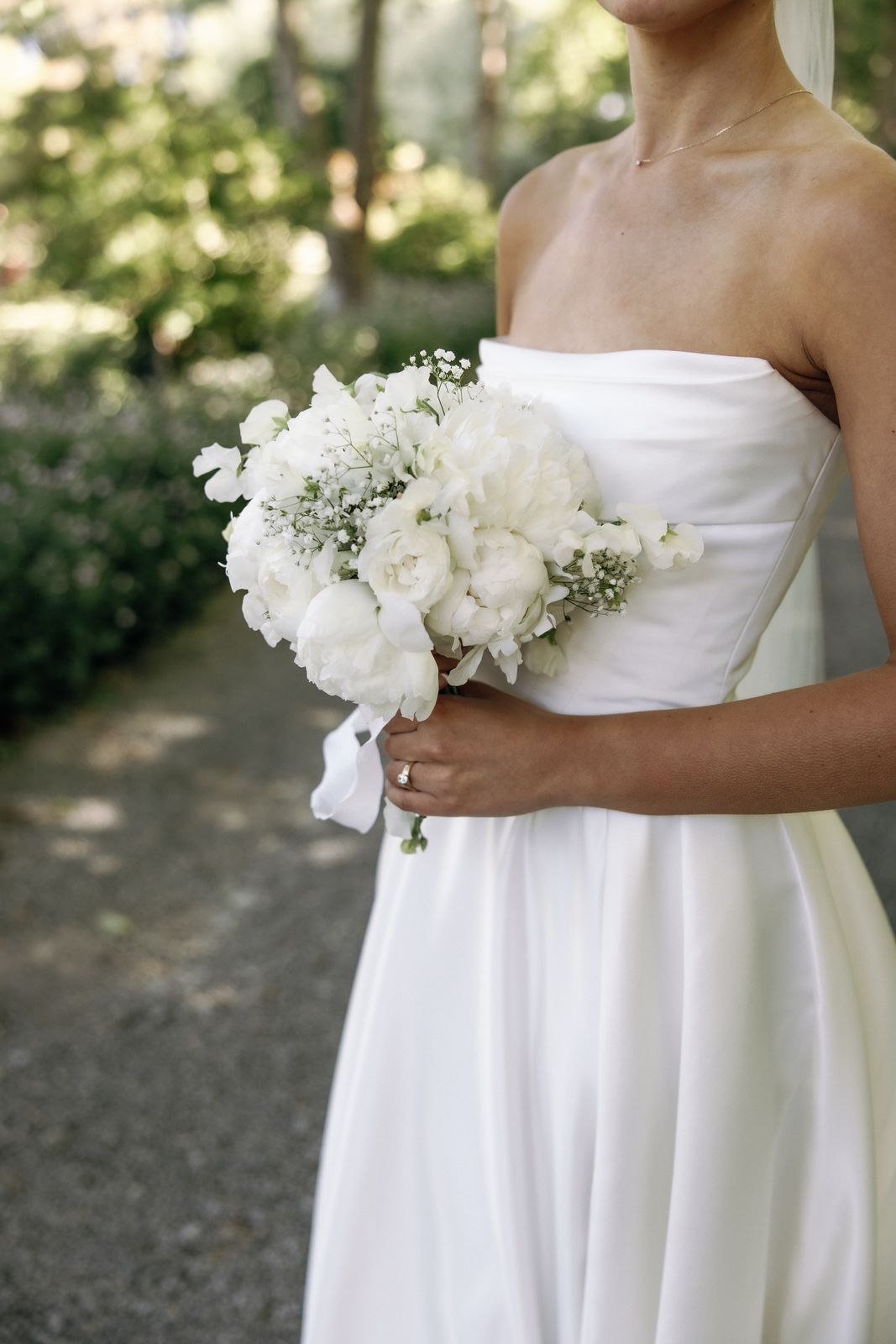 Samara wearing her bespoke wedding dress designed by Sarah Stoute, Christchurch — photo 15