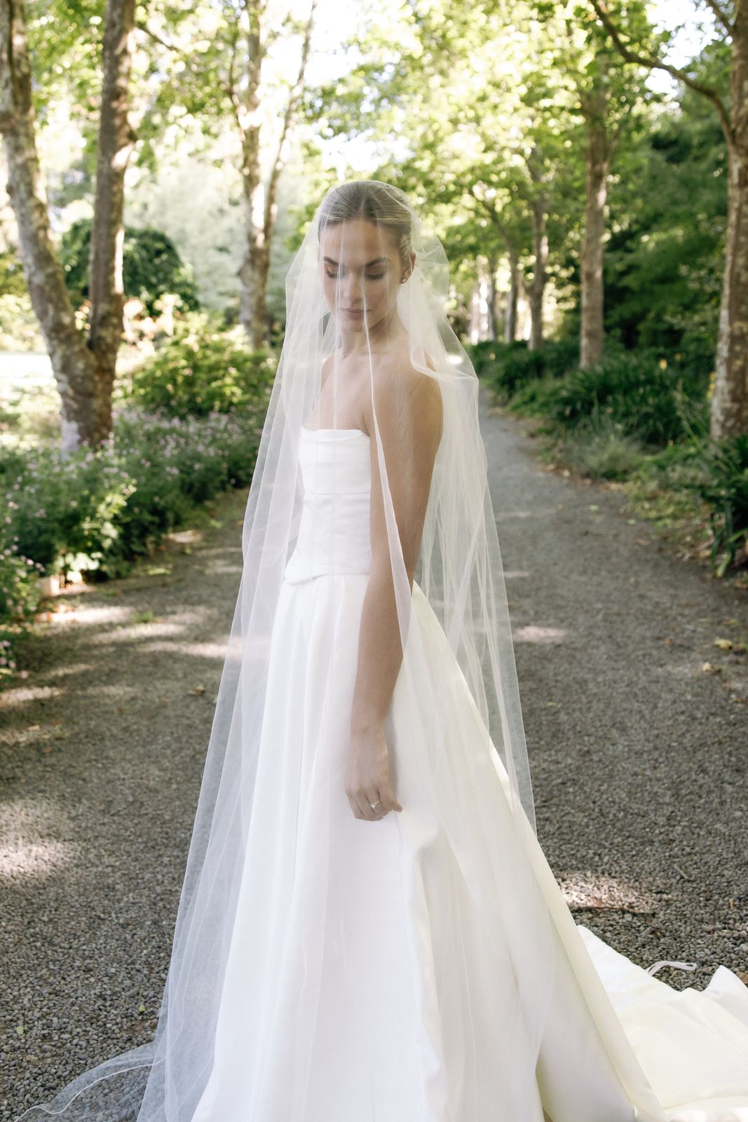 Samara wearing her bespoke wedding dress designed by Sarah Stoute, Christchurch — photo 17