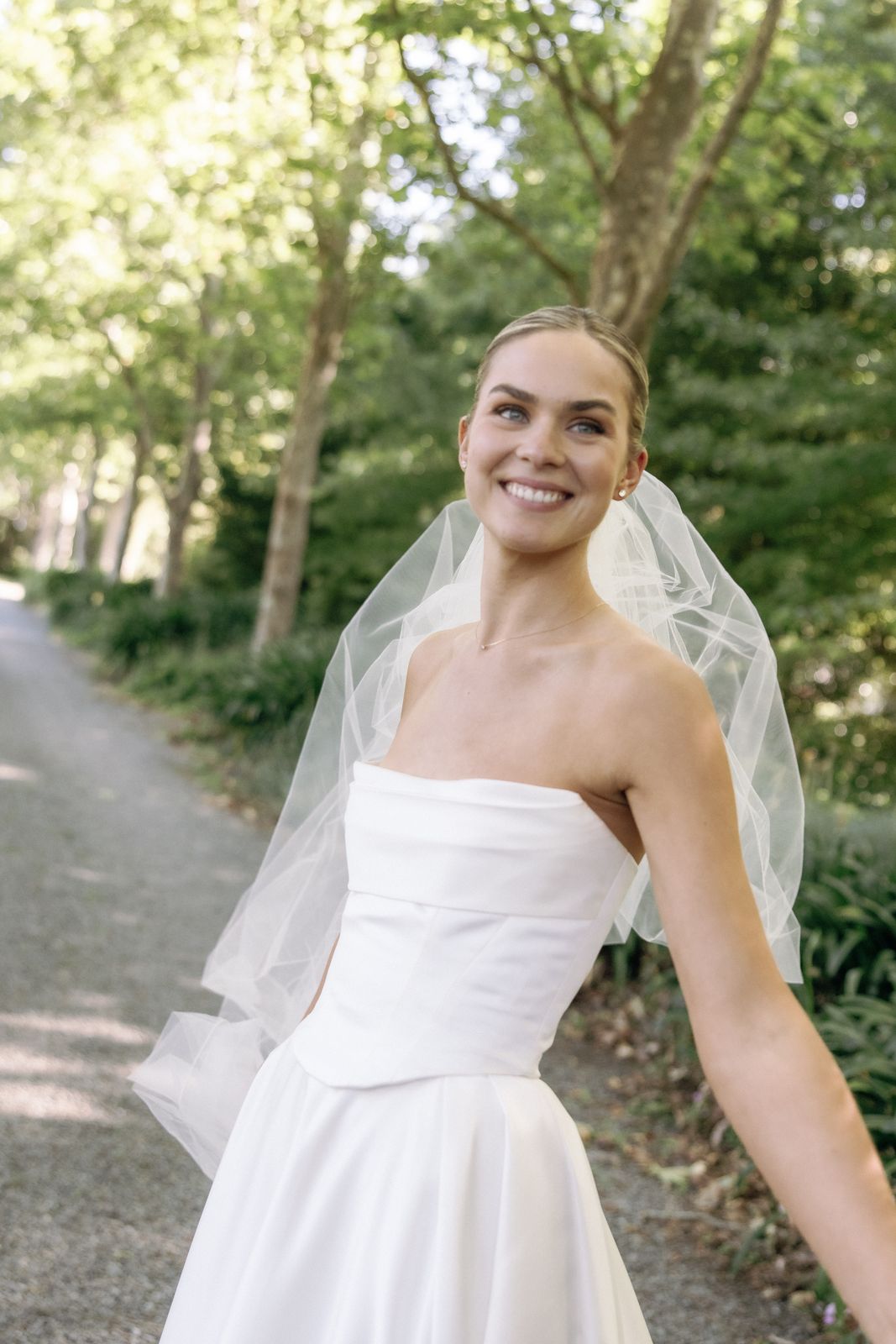 Samara wearing her bespoke wedding dress designed by Sarah Stoute, Christchurch — photo 19