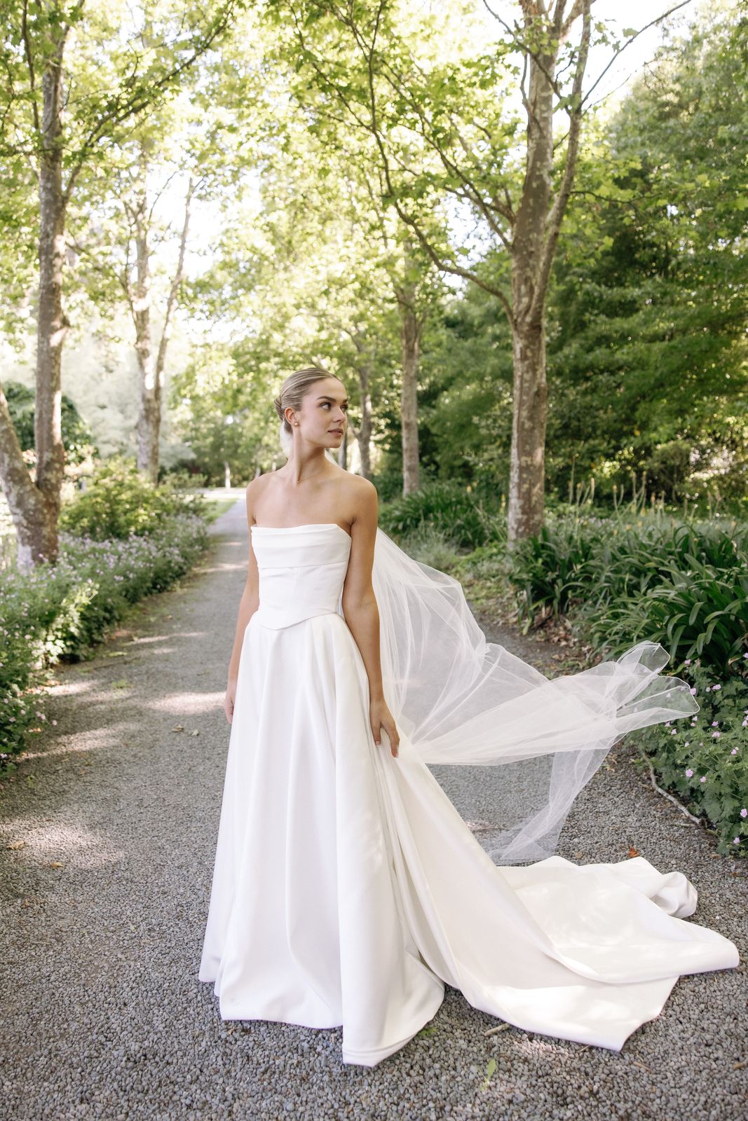 Samara wearing her bespoke wedding dress designed by Sarah Stoute, Christchurch — photo 20