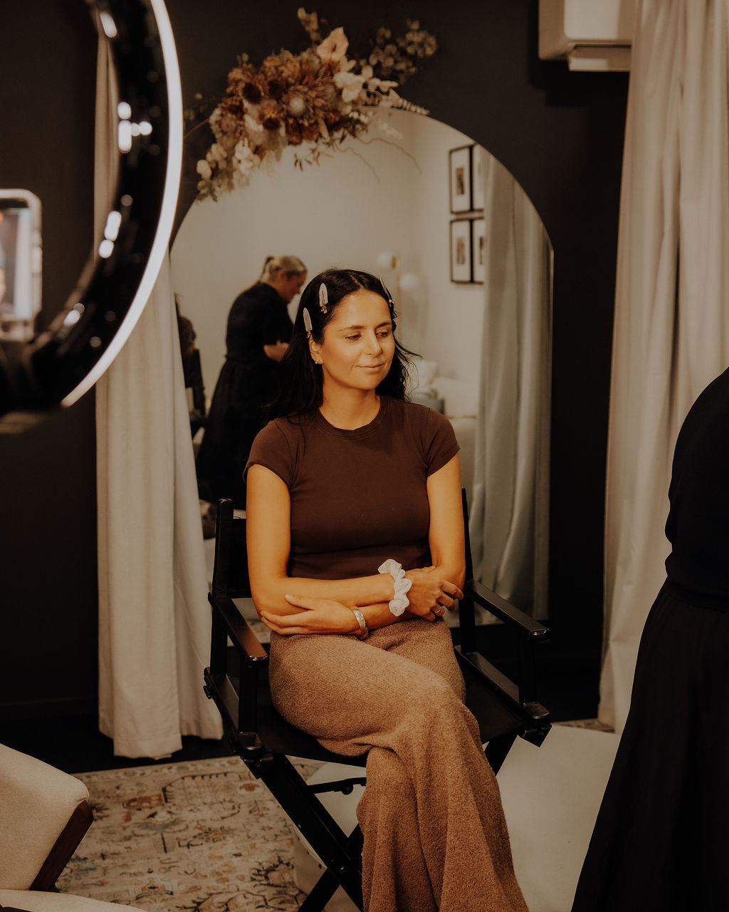 The model in the makeup chair during preparations for the FOUNDATION editorial, hair and makeup by Jessica Nicole
