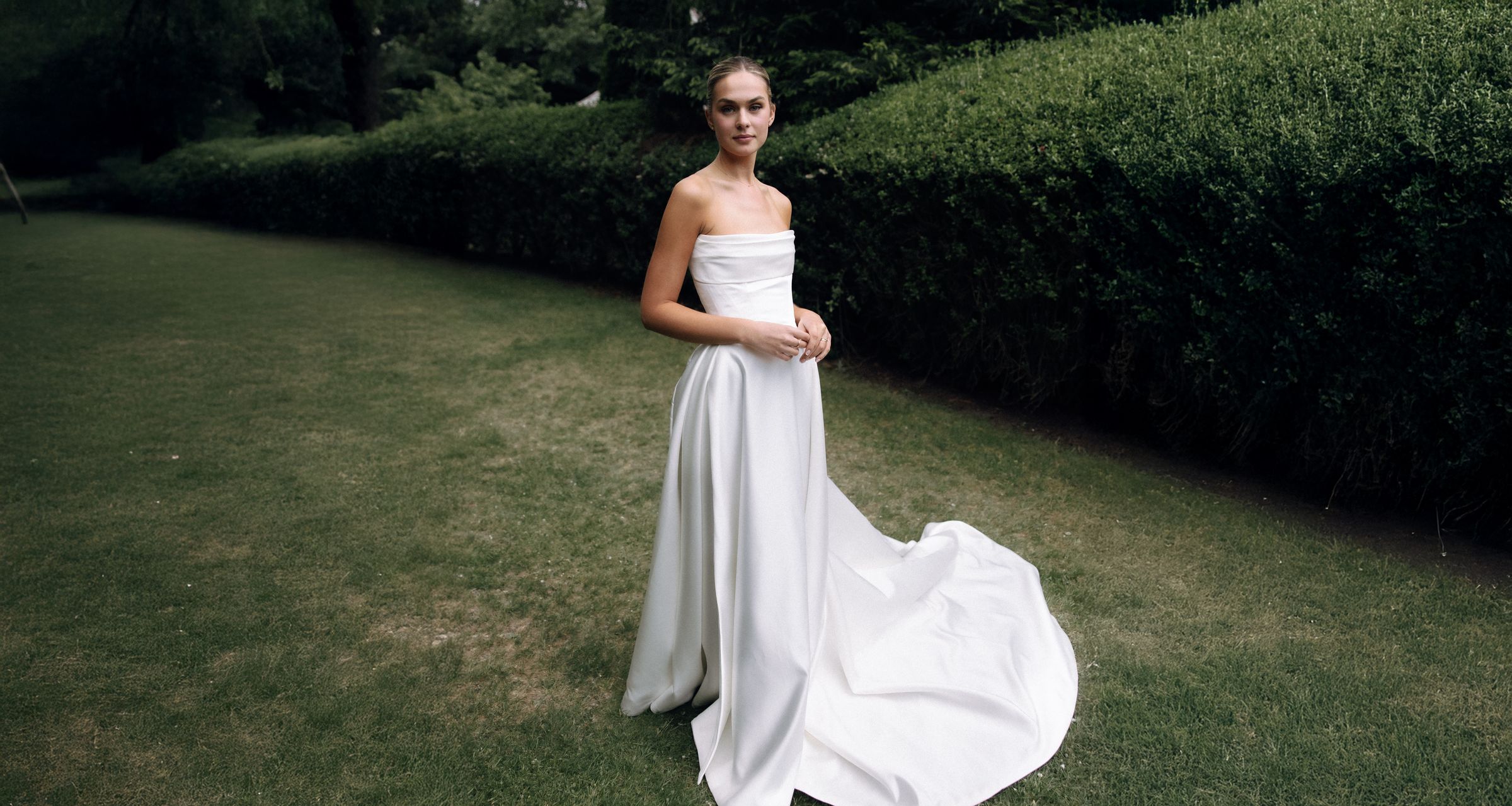 Structured satin bespoke wedding gown designed and handmade in Christchurch by Sarah Stoute