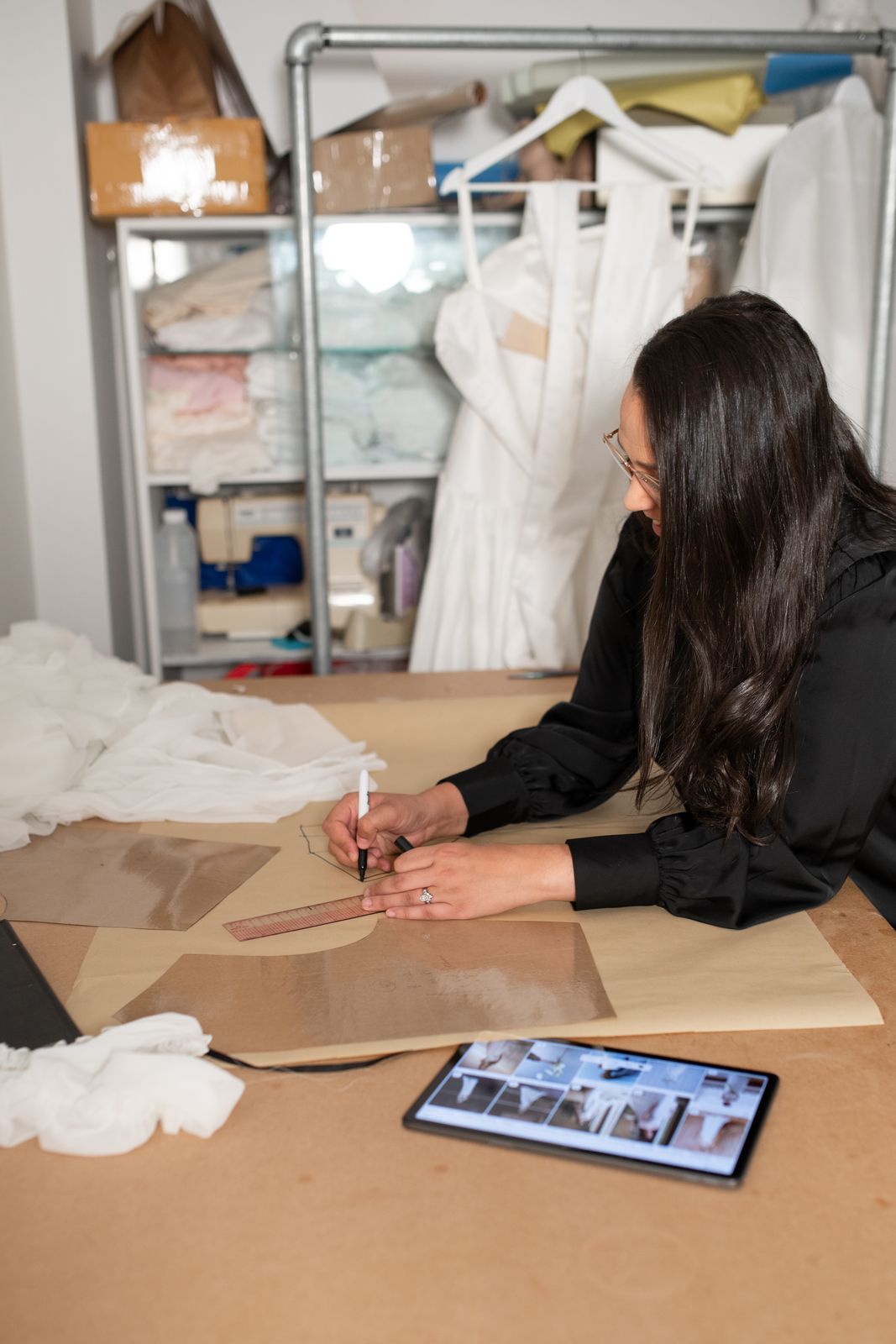 Pattern cutting a bespoke wedding dress in the Sarah Stoute Bespoke studio, Christchurch