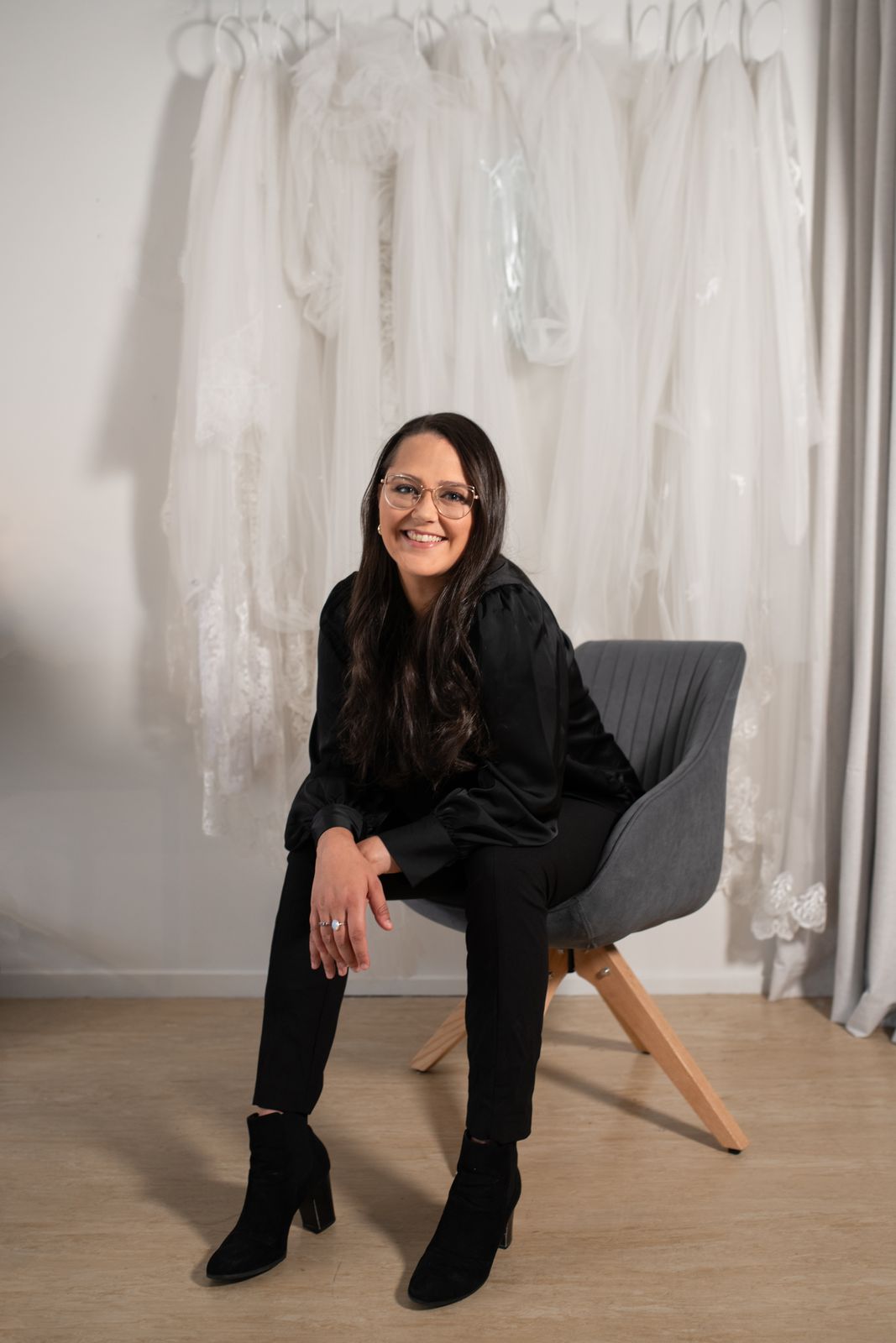 Sarah Stoute, award-winning bespoke wedding dress designer, in her Christchurch studio